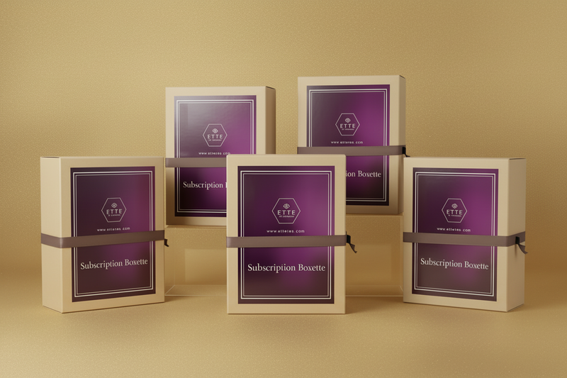 Subscription box with purple label and brown ribbon on a light gray background