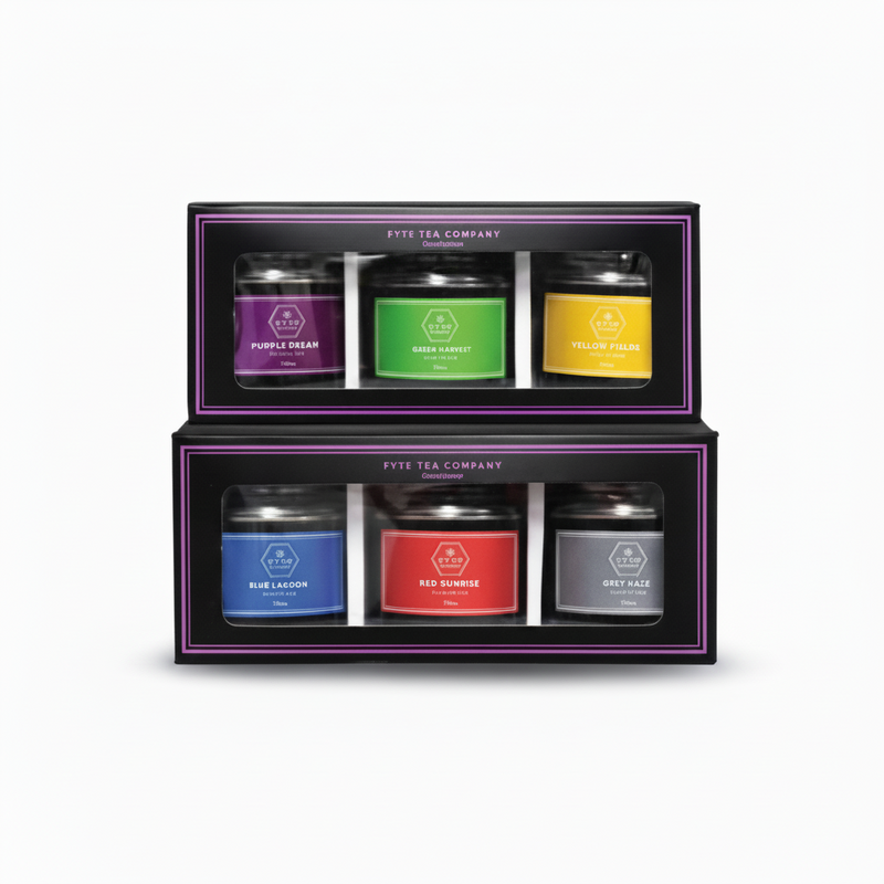 Set of tea tins from the Pye Tea Company in a display box on a white background
