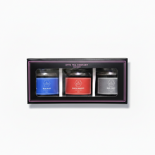 A box of Ette Tea Company's Mini Mix featuring three different colored jars of tea, each labeled with a movie quote.